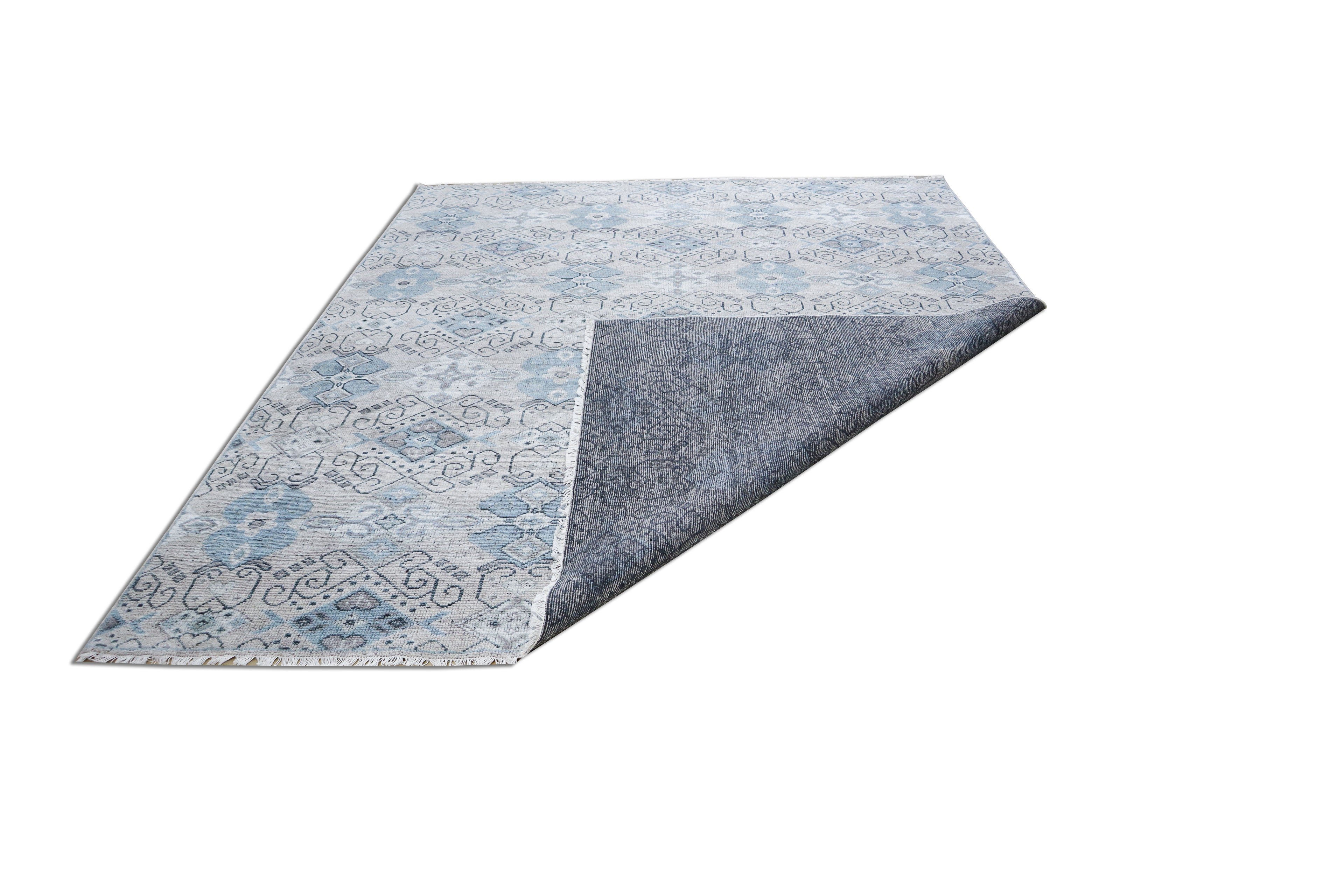 Baatha Hand Knotted Wool Rug Beige